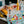 Load image into Gallery viewer, Laura Barnes Teal Cocktails Tea Towel
